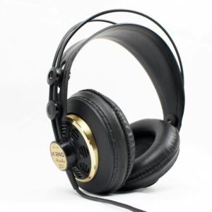 High-quality black and gold studio headphones with thick padding on a white background, ideal for music professionals.